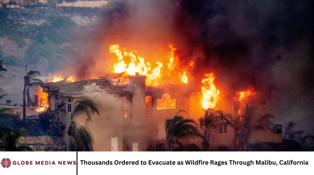 Thousands Ordered to Evacuate as Wildfire Rages Through Malibu, California