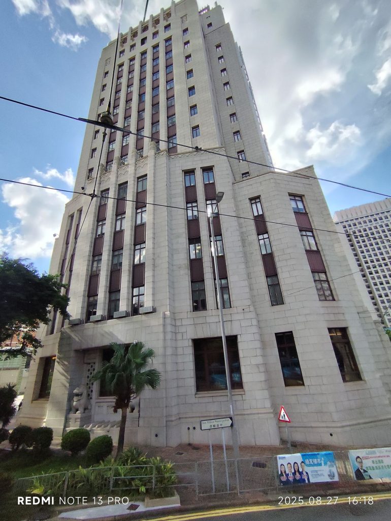 Central Bank Decision Will Shape Borrowing Costs Ahead The grand facade of a central bank building with columns and stone steps in a financial district.